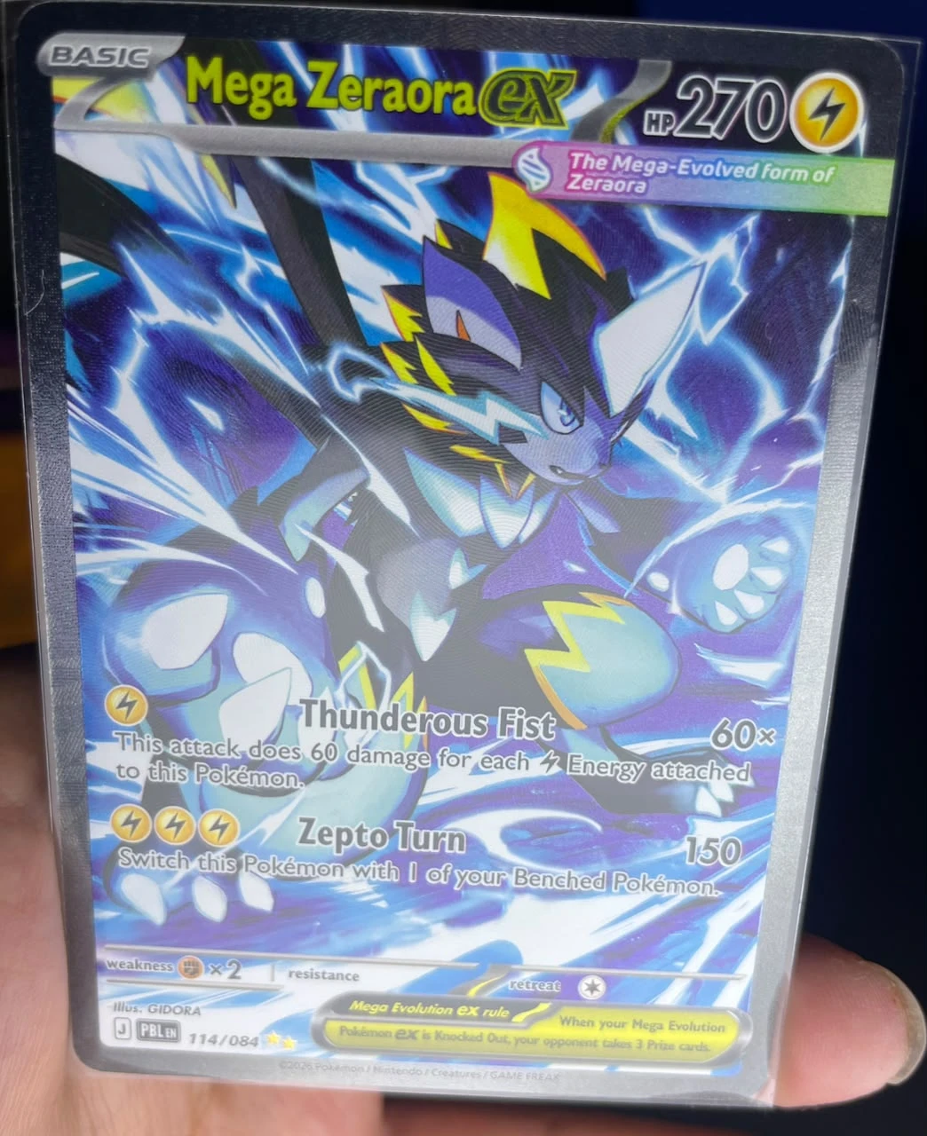 Foto real de Mega Zeraora ex