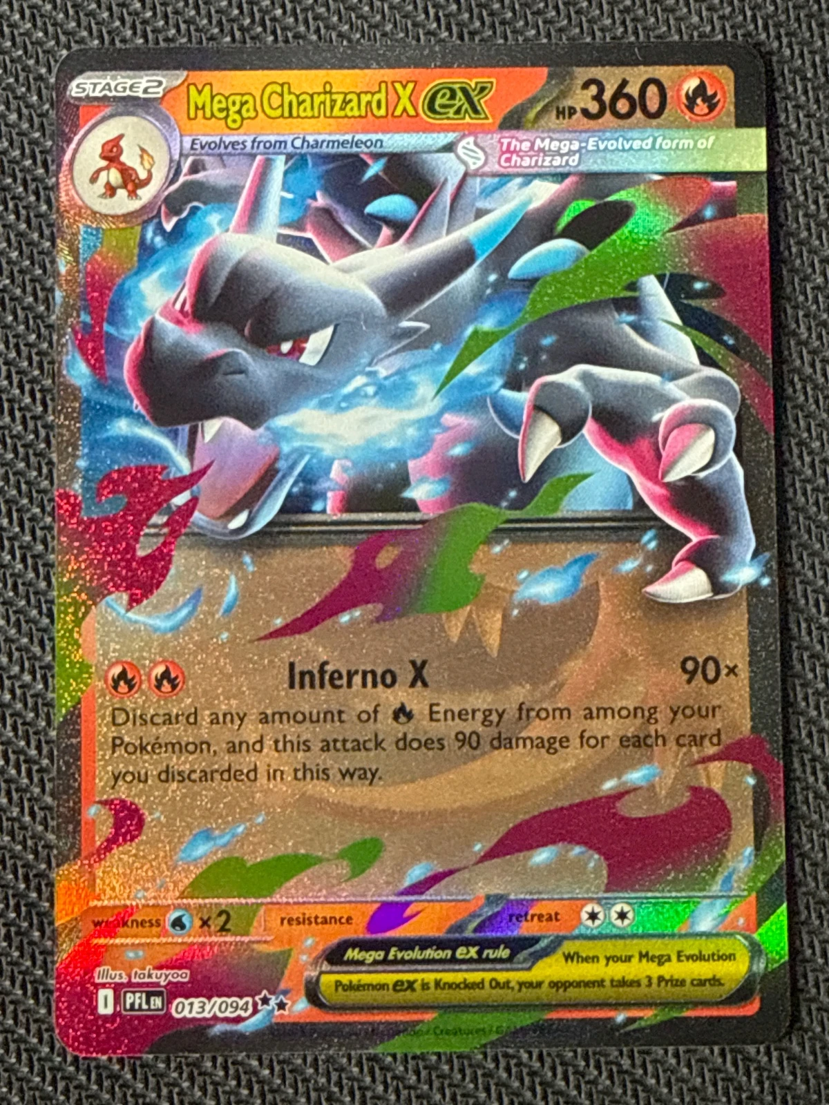 Foto real de Mega Charizard X ex